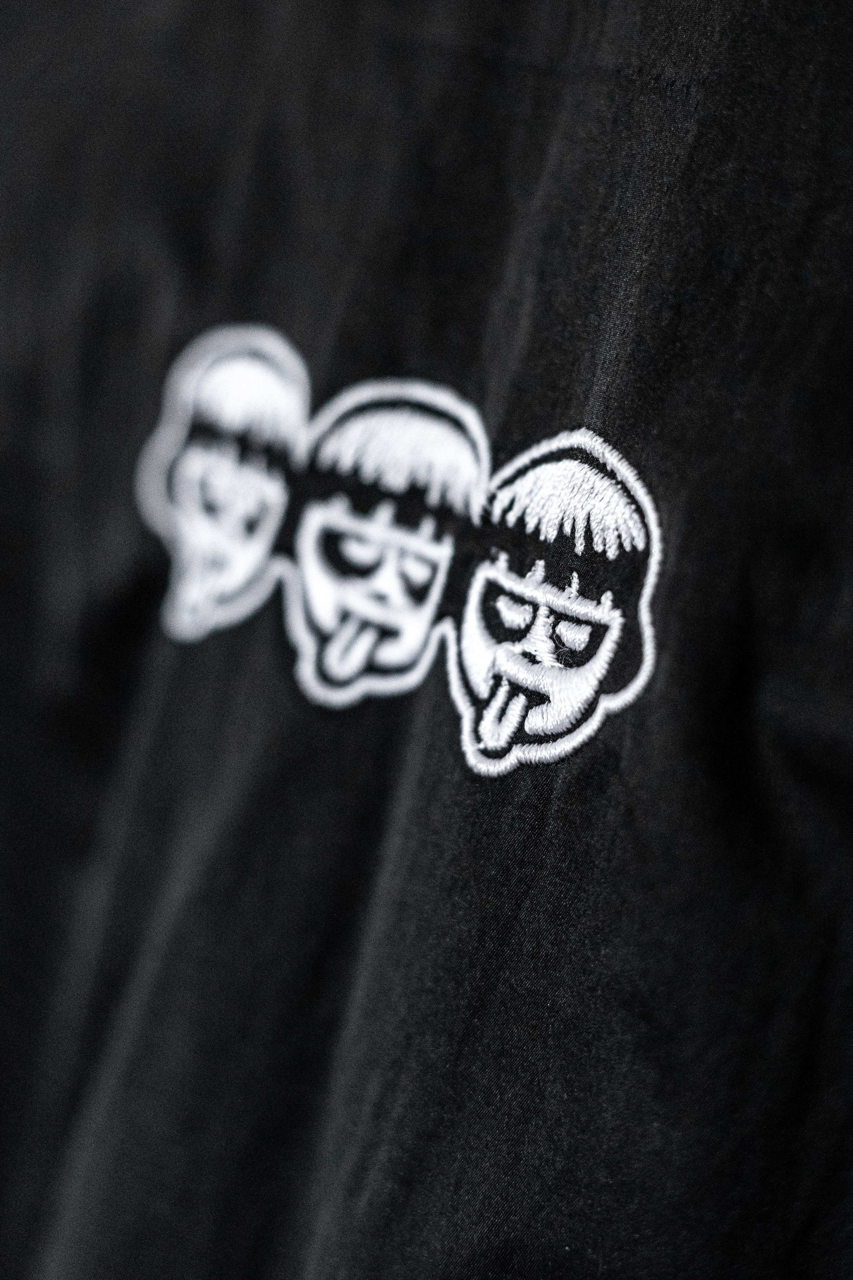 TRACKSUIT CORTAVIENTOS NEGRO